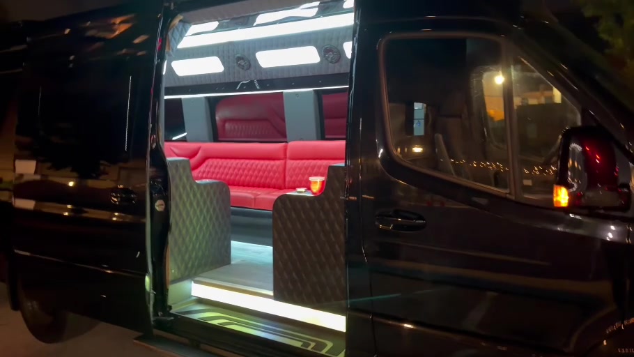Illuminated entry and red seating inside the ONWARD Sprinter